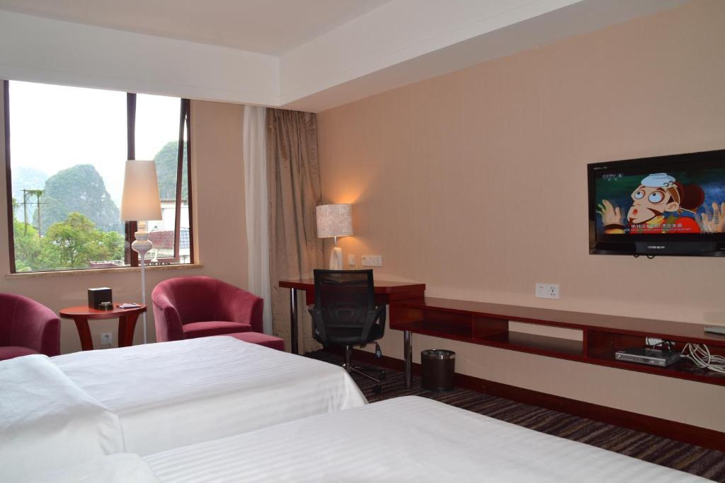 Elite Garden Hotel Яншуо Номер фото